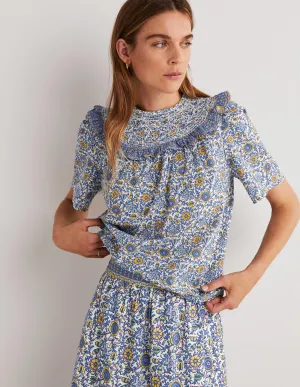 Smocked Neck Printed Top-Ivory. Enchanting Twig